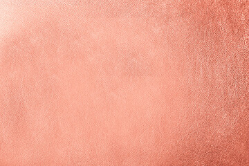 Texture of rose gold leather as background, closeup