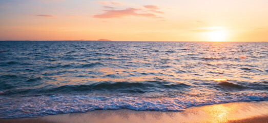 Fototapeta premium landscape viewpoint vertical summer sea wind wave cool holiday calm coastal sunset sky light orange golden evening day look calm Nature tropical Beautiful sea water travel Bangsaen Beach thailand 
