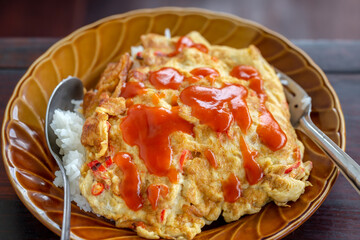 Thai omelets with streamed rice