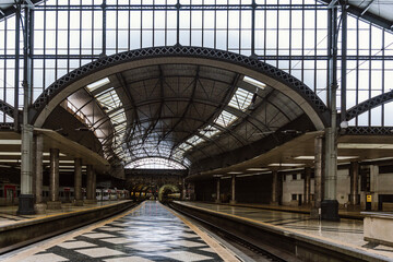 Rossio train station in Lisbon. Inside of the building with platform and train tracks waiting for departure