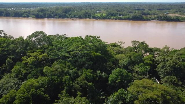 Aerial view of the Madre de Dios river in the Peruvian Amazon rainforest, South America.