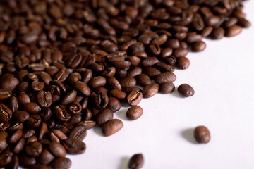 Roasted coffee beans background  colombian coffe rought coffee