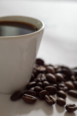Espresso Coffee Cup With Beans On Vintage Table