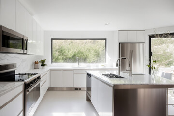Naklejka na ściany i meble A modern, minimalist kitchen with white cabinets, marble countertops and stainless steel appliances. Generative AI