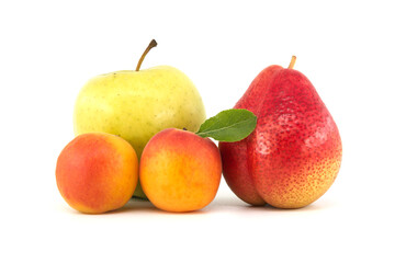 Green apple, apricots and pear isolated on a white