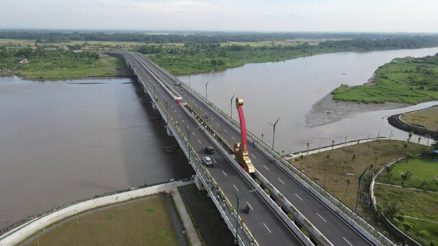 Aerial view, the new bridge of Kretek 2. The bridge that has the Keris icon. The southern causeway of Yogyakarta (JLLS) passes through the Depok lagoon.