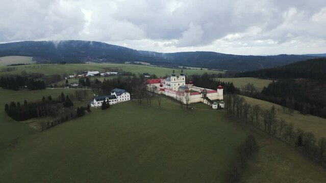 Aerial shot of the Hedec pilgrimage site, featuring a beautiful monastery on the mountaintop dedicated to the Mother of God.