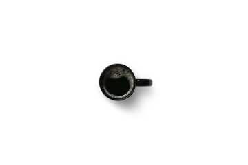 Black coffee with natural foam in a cup isolated on white background isolated, clipping path included.
