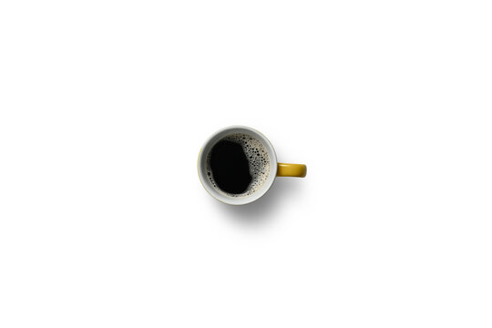 Black coffee with natural foam in a cup isolated on white background isolated, clipping path included.