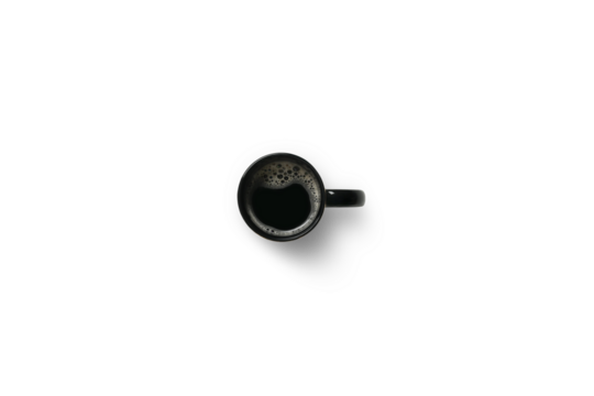 Black coffee with natural foam in a cup isolated on white background isolated, clipping path included.