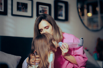 Girl Using a Spacer with Asthma Inhaler For Respiratory Disease. Mom helping her beloved daughter to get over asthma attack
 - obrazy, fototapety, plakaty