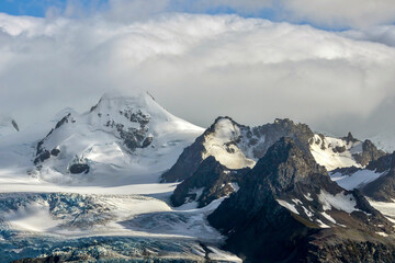 Fototapeta na wymiar Clouds obscuring mountain peak on Elephant Island in Antarctica