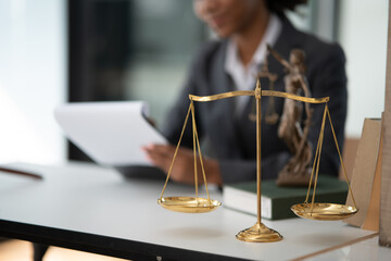 Lawyers Asiawoman   having through online Concepts  of Legal services at the law office.