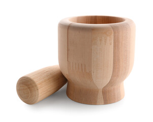 Wooden mortar with pestle isolated on white background