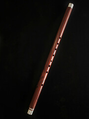 Thai flute. Flute made from siam rosewood with aluminum wrap design