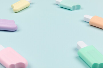 closeup of popsicles on cyan surface icecream