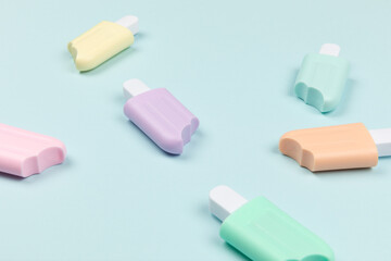 closeup of popsicles on cyan surface icecream