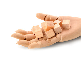 Wooden hand with cubes isolated on white background