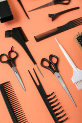 Composition with hairdressing accessories on red background, closeup