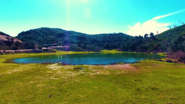 shot by drone lake of tamezguida M&eacute;d&eacute;a Algeria against the light with a halo of light