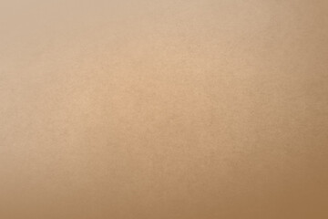 Plain neutral pale brown color paint on blank cardboard box texture background with space and...