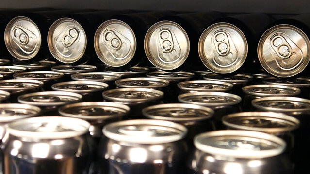 Close-up of many beautiful silver-black cans