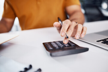 Calculator, budget and man hands with finance, profit check and financial accounting on office desk closeup. Person or entrepreneur typing and calculating numbers in taxes, debt or business growth