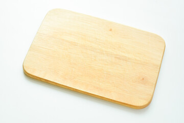 brown wooden cutting board isolated on white background, plank wood for cooking in the kitchen