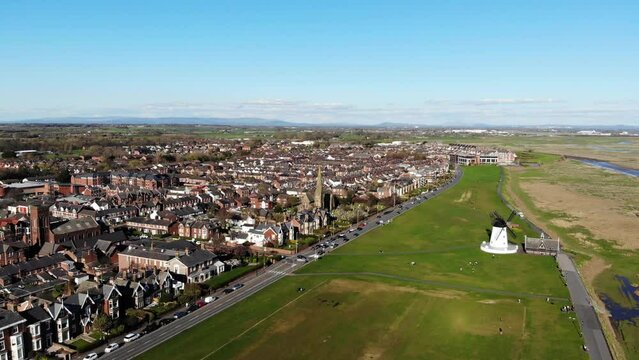 Eagle eye view of Lytham Windmill and St John the Divine Church on a sunny day