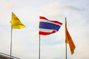 National Thai flag and Buddhist flags on the background of Bangkok, Golden Mount Temple (Wat Saket), Thailand.