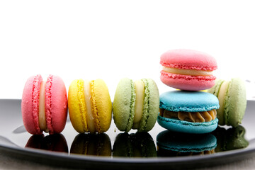 French Macaroons On White Boards Background. High quality photo
