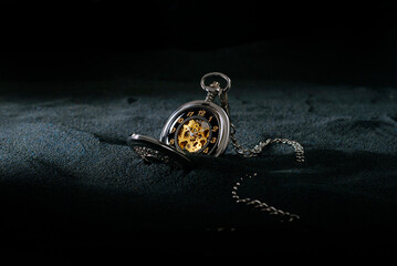 pocket watch on dark background