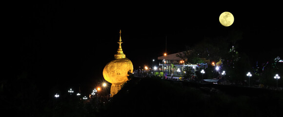 Kyaiktiyo landmark of Myanmar.
Many people come to pay their respects to the Golden Rock Pagoda located on the top of the mountain.
The gold color of the stone against the black at night makes it stan