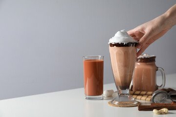 Tasty fresh summer dessert - chocolate milkshake, space for text