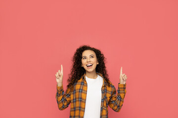 Young woman in casual wearing on pink background