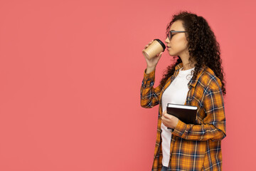 Young woman in casual wearing on pink background