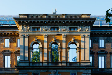 Reflections on windows of old building