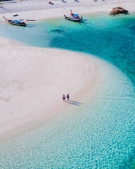Koh Lipe Island Southern Thailand with turqouse colored ocean and white sandy beach at Ko Lipe