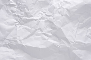 White crumpled paper texture background, clean white wrinkled paper, top view.