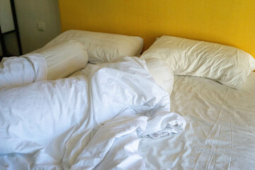 Fototapeta na wymiar Messy hotel mattress in the morning. Good Illustration about staycation