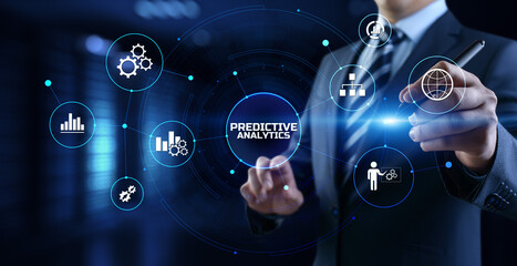 Predictive analytics. Businessman pressing button on screen.