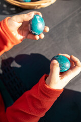 hand holding egg, easter