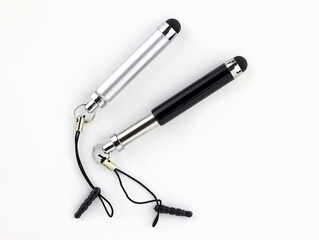 Mini stylus for capacitive screens on a white background. Gray and black stylus top view. Mini...
