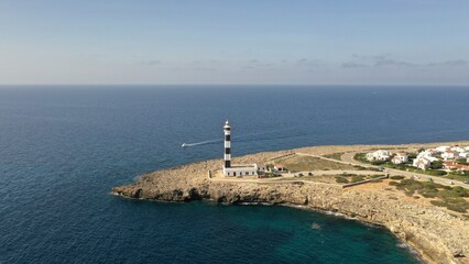 Fototapeta na wymiar Phare du Cap d'Artrutx à Minorque, archipel des îles Baléares en Espagne