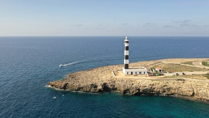 Fototapeta na wymiar Phare du Cap d'Artrutx à Minorque, archipel des îles Baléares en Espagne