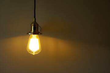 A metallic lamp hanging in a church