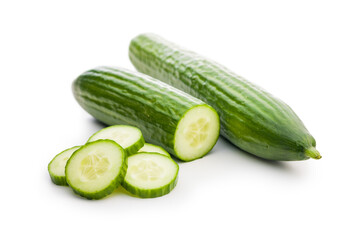 Sliced fresh green cucumber isolated on white background.