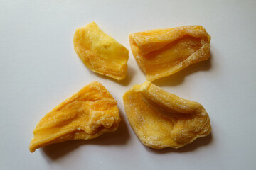 Four pieces of fleshy yellow dried jack fruit from above