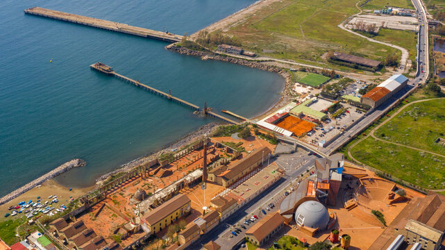 Aerial view of the ex Italsider area of Bagnoli from the Posillipo hill, in the metropolitan city of Naples, Campania, Italy. It's a disused industrial complex on the coast of Mediterranean sea.