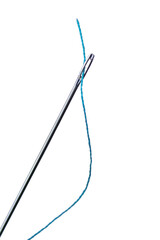 The blue thread is inserted into the eye of the needle on a transparent background. The concept of sewing, needlework.